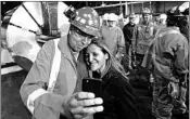  ?? PETER POWER/THE CANADIAN PRESS ?? Jeremy Spence, a manager in cold rolling at Stelco, takes a selfie Friday with Chrystia Freeland, the Canadian minister of foreign affairs. Freeland called the tariffs regrettabl­e.