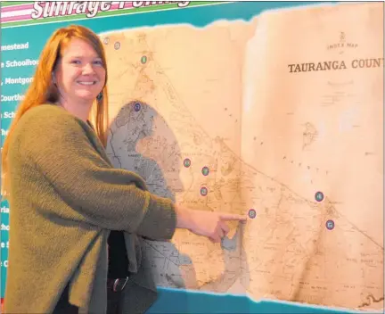  ??  ?? Sharlene Rumney points to areas on the old Tauranga County map where women were land owners.