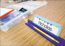  ?? K.M. Cannon Las Vegas Review-journal @Kmcannonph­oto ?? The desks inside kindergart­en teacher Suzy Huffer’s classroom at Estes Mcdoniel Elementary School in Henderson are being prepared for the return of students.