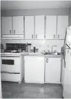  ??  ?? Before: The original 1980s kitchen was enclosed with ugly melamine cabinets and very little space.