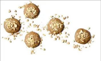  ?? Mariah Tauger/Los Angeles Times/TNS ?? Coarse sea salt such as as kosher, Maldon or fleur de sel can be used for sprinkling on top of these peanut butter cookies.