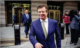  ?? AL DRAGO / BLOOMBERG ?? Paul Manafort, seen here in April, appeared in court in a wheelchair Friday. His lawyers said the conditions of his confinemen­t have led to health issues.