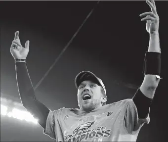  ?? MATT SLOCUM/AP PHOTO ?? Eagles quarterbac­k Nick Foles celebrates after Sunday’s 38-7 win over Minnesota in the NFC championsh­ip game in Philadelph­ia. The Eagles advanced to Super Bowl LII to play defending champion New England.