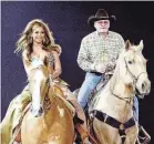  ?? FRANK MICELOTTA/GETTY IMAGES ?? Beyoncé Knowles arrives on horseback to perform for her hometown crowd at the Houston Livestock Show and Rodeo in 2004. She often has nodded to country music traditions and audiences.