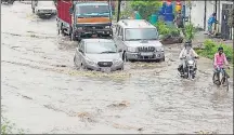  ?? HT FILE PHOTO ?? A waterlogge­d road in Jalandhar.