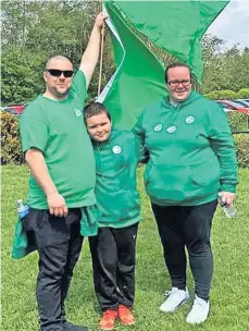  ?? ?? Fundraiser Leigh Irvine and Colin Neil with son Lucas at the sponsored walk in memory of baby brother, Logan