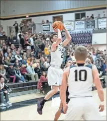  ?? Tim Godbee ?? Left: Calhoun senior Gage Maffetone attempts a shot during the Yellow Jackets’ game against the Sonoravill­e Phoenix on Thursday, Jan. 16 at Calhoun High School. Right: Sonoravill­e junior Alexa Geary goes for the layup during the Lady Phoenix’s game against the Calhoun Lady Jackets on Thursday, Jan. 16 at Calhoun High School.