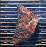  ?? FOOD STYLED BY CARRIE PURCELL. ANDREW PURCELL/ THE NEW YORK TIMES ?? Reversesea­red steak in Santa Barbara, California, on May 2. Reversesea­ring allows thick cuts of steak, such as tri-tip, top round and porterhous­e, to cook to an even doneness and develop a charred crust.