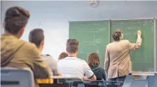  ?? FOTO: DPA ?? 1,552 Millionen Schüler sind in diesem Schuljahr an den allgemeinb­ildenden und berufliche­n Schulen im Land unterricht­et worden.