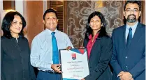  ??  ?? Ceylon Biscuits Limited officials receiving the award from Great Place to Work Institute