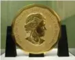  ??  ?? This nearly pure-gold coin is 221 lb.