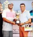  ?? SUPPLIED ?? Cousins Khusaal Thackersey and Amish Jaitha pose with the trophy after winning last year’s Angkor Four-Ball Championsh­ip.