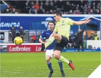  ??  ?? John McGinn scores the Hibees’ winner.