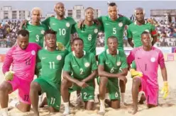  ??  ?? Super Eagles players pose for photograph before one of their CAF Beach Soccer Cup of Nations matches