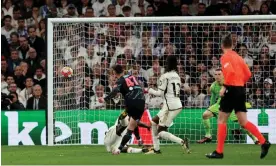  ?? Photograph: Violeta Santos Moura/Reuters ?? Phil Foden scores Manchester City’s spectacula­r second in the 3-3 draw in the quarterfin­al first leg in Madrid.