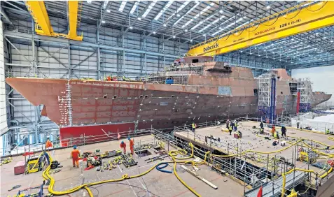  ?? ?? HMS Venturer, the Royal Navy’s first Type 31 warship, is being built at Rosyth, on the Firth of Forth in Scotland. Below, David Lockwood, Babcock’s chief executive