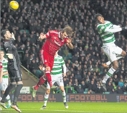  ?? Picture: SNS ?? HEAD BOY: Celtic’s Dedryck Boyata rises to score the only goal of the match in the 57th minute.