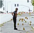  ?? Foto: WichmannTV, dpa ?? In Erfurt wurden für die Fahndung Stra  ßen gesperrt.