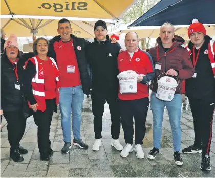  ?? ?? Bit O’Red Supporters Trust members were out in force for the launch of Benny’s Bull Run in Queen Maeve’s Square last Friday.