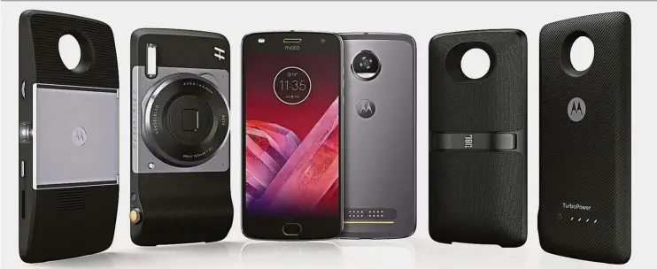  ?? — Motorola ?? Enhance the Moto Z2 Play with Moto Mods such as the (l - r) projector, zoom lens, speaker and battery pack.