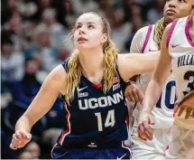  ?? Laurence Kesterson/Associated Press ?? UConn's Dorka Juhasz (14) fights for position under the basket during Saturday's win at Villanova.