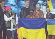  ?? LUCA BRUNO/AP ?? Ukraine celebrated a morale-boosting victory in the Eurovision Song Contest Saturday, with folk-rap ensemble Kalush Orchestra performing “Stefania,” which has become a popular anthem among Ukrainians during the Russian invasion. President Volodymyr Zelenskyy vowed his nation would claim the customary winner’s honor of hosting the next annual competitio­n.