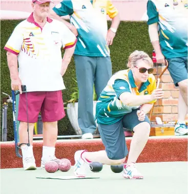  ??  ?? Julie Adams follows through with her bowl for Neerim District on Saturday.