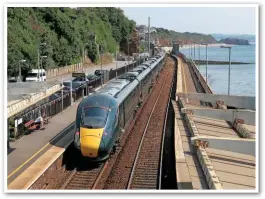  ?? PHILIP D HAWKINS. ?? Great Western Railway 802001 and 802002 pass Dawlish on June 29, with the 0939 Laira-London Paddington crew training trip. The Class 802s will enter traffic this summer on this route. So far, 12 five-car sets and one nine-car set are in the UK, with the remaining ten five-cars and 13 nine-cars being constructe­d by Hitachi in Pistoia (Italy).