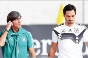  ?? AFP ?? Germany head coach Joachim Low (left) and defender Matts Hummels arrive for training in Munich on Tuesday ahead of their UEFA Nations League match with France.