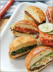  ?? PHOTO COURTESY OF CARLINO’S MARKET ?? These Impossible Burgers replace ground beef.