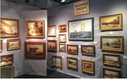  ??  ?? A look at the David Brooker Fine Art booth shows marine art, seascapes and landscapes.