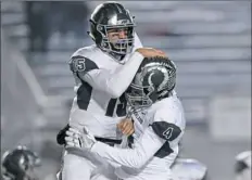  ?? Rebecca Droke/Post-Gazette ?? This was a scene played out often this season: Pine-Richland celebratin­g a touchdown. Phil Jurkovec, left, and Dawson Goltz celebrate after Jurkovec scored a touchdown in the PIAA Class 6A championsh­ip Dec. 9 against St. Joseph's Prep.
