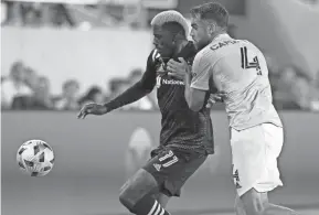  ?? BARBARA J. PERENIC/COLUMBUS DISPATCH ?? Columbus Crew forward Gyasi Zardes and his teammates hope to carry the momentum of their 2-1 win over CF Montreal into this week’s contests against Cruz Azul and the Philadelph­ia Union.