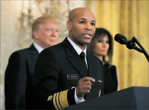  ?? Manuel Balce Ceneta/Associated Press ?? Surgeon General Jerome Adams speaks last month during a National African American History Month reception hosted by President Donald Trump and first lady Melania Trump at the White House. The nation’s chief doctor wants more Americans to start carrying...