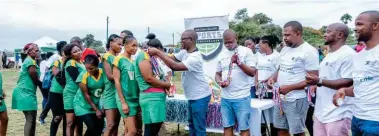  ?? ?? ▲ Netball champs Mbutfu Buffaloes players receiving their gold medals.