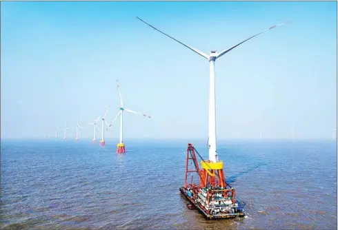  ?? YAO FENG/CHINA DAILY ?? An overview of an offshore wind farm in Zhejiang province’s Zhoushan city in China.