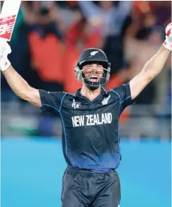  ?? PHIL WALTER/GETTY IMAGES ?? ELATION: Grant Elliott celebrates hitting the winning runs in yesterday’s semi-final victory in front of a rapturous crowd in Auckland.