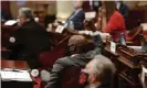  ??  ?? State senator Steve Bradford raises his fist in celebratio­n as the senate approves a measure to overturn the ban on affirmativ­e action on the November ballot. Photograph: Rich Pedroncell­i/AP