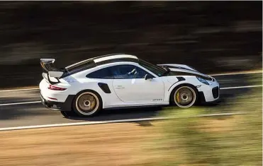  ??  ?? Right: cooling is a major challenge on the GT2 RS, as evidenced by massive vents in the nose; front compartmen­t is home to a 5-litre water tank for the intercoole­rs’ water-spray system