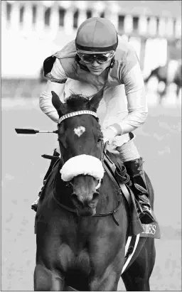  ?? COADY PHOTOGRAPH­Y ?? Sandstone followed up her nine-length maiden victory with a 10 3/4-length romp in the Rags to Riches (above) at Churchill.