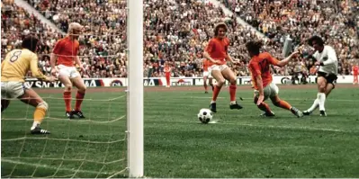  ??  ?? Gerd Muller beating Dutch goalkeeper Jan Jongbloed to score the winner in the 1974 World Cup final.