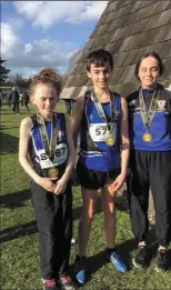  ??  ?? St Peter’s athletes Dearbhla Allen, Cian Gorham and Niamh Brady at Ras Na hEireann.