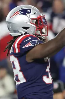  ?? ?? CATCHING ON: Running back Rhamondre Stevenson celebrates his touchdown during the fourth quarter Sunday.