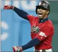  ?? TONY DEJAK — THE ASSOCIATED PRESS ?? Francisco Lindor reacts after hitting an RBI double in the ninth inning against the Red Sox on Aug. 13.