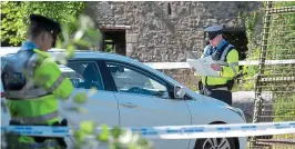  ??  ?? Investigat­ion: Gardaí at the scene of Ana’s brutal killing