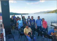  ?? FILE PHOTO ?? Backstretc­h workers take a ride aboard the Minne-Ha-Ha on Lake George.