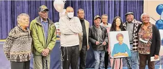  ?? Courtesy of Middletown Public Schools ?? The family of former Wesley Elementary School educator Vivian McRae Wesley, Middletown’s first Black educator, gathered March 8 for a photograph with her new portrait.
