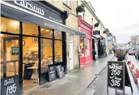 ??  ?? Left, Nick Mitford outside Kitchen Artillery in Clifton; Above, cafes and eateries help draw shoppers to Clifton Village; Below left, foodie hotspot Chandos Deli