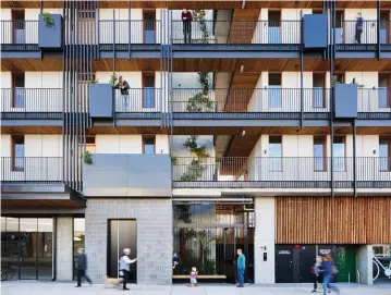  ??  ?? The location of Nightingal­e 2, adjacent to a railway platform, enabled Six Degrees Architects to exploit light and cross-ventilatio­n. Photograph: Tess Kelly
Nightingal­e 2 includes 20 apartments, shared communal spaces and three tenancies on a site of just over 500 square metres. Photograph: Tess Kelly