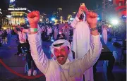  ?? KAMRAN JEBREILI/ASSOCIATED PRESS ?? Emiratis celebrate after the Hope probe enters Mars orbit as a part of Emirates Mars mission, in Dubai, United Arab Emirates, on Tuesday.